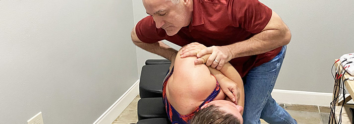 Chiropractor Conroe TX Ryan Roeder Adjusting A Patient