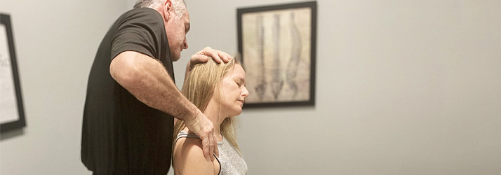 Chiropractor Conroe TX Ryan Roeder Adjusting A Patient